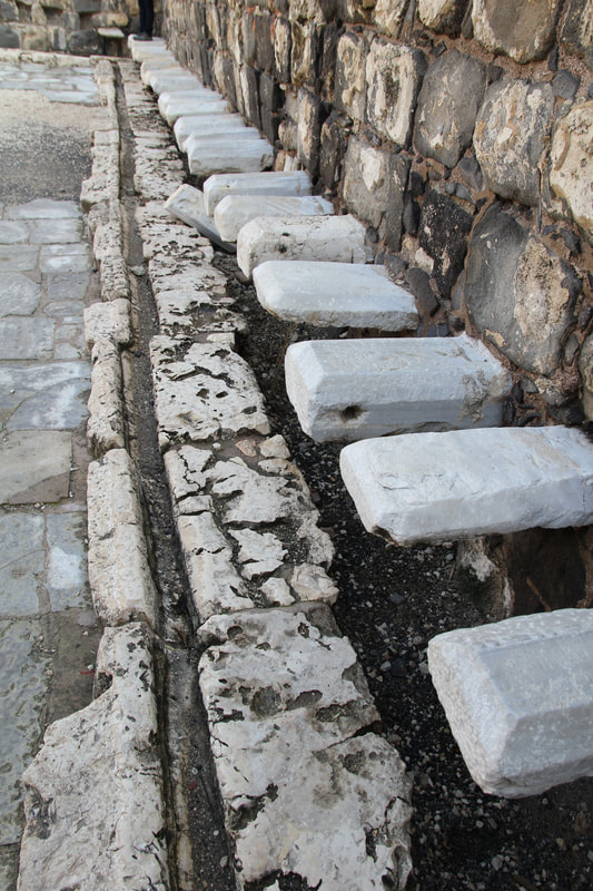 Ancient toilets in the bathroom of Beit Shean