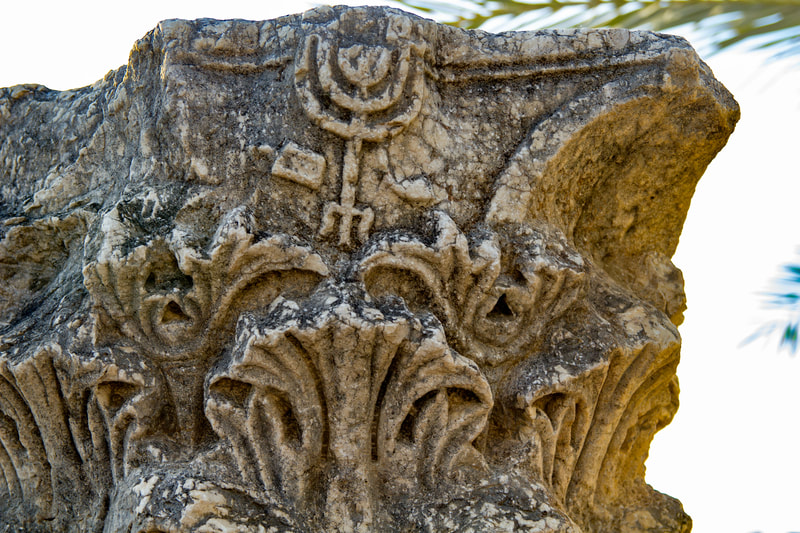Menorah carving at Capernaum. 