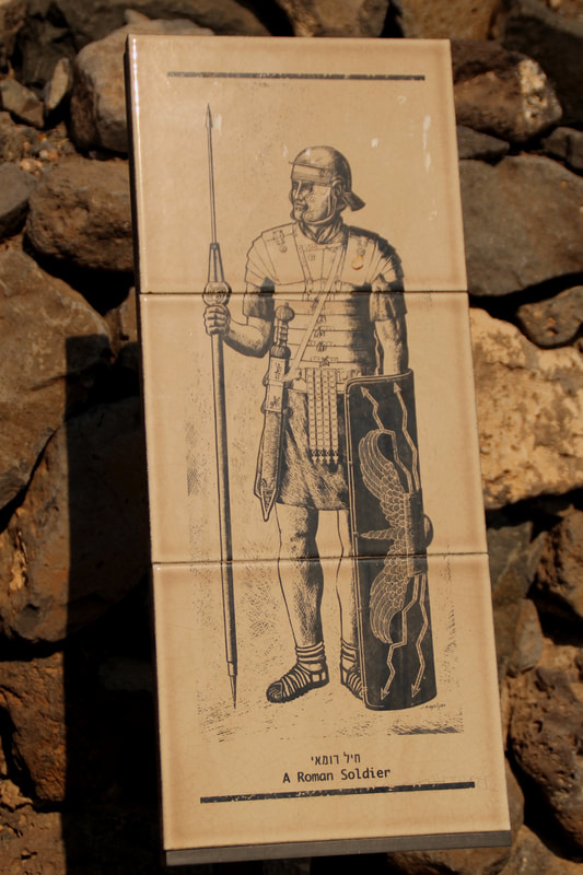 Sign depicting a Roman soldier at Gamla. 